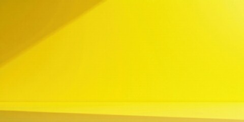 Vibrant Yellow Background with Subtle Shadow and Empty Surface Ideal for Product Placement and Presentation