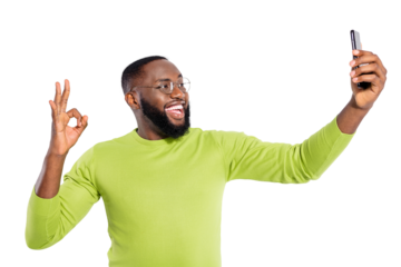 Portrait  of cheerful youth in eyewear eyeglasses making photo giving feedback wearing green pullover isolated over white background