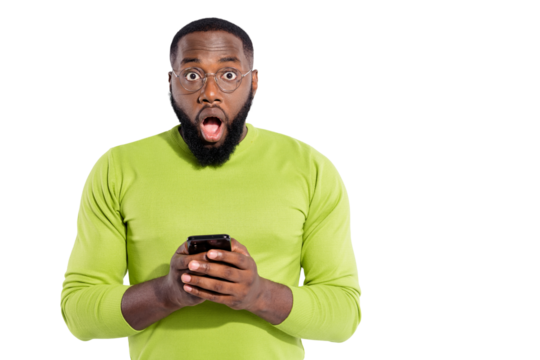 Portrait of impressed person in eyeglasses eyewear holding modern technology screaming unbelievable wearing green sweater isolated over white background