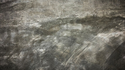 An abstract gray texture with smooth, flowing patterns.