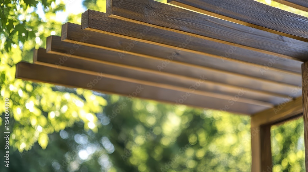 Poster Pergola structure with diagonal lines framed by lush greenery in a bright outdoor setting creating visual interest and depth.