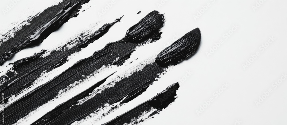 Aufkleber Macro image of black paint strokes on a white background highlighting texture and depth suitable for artistic and creative design applications