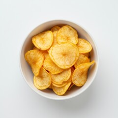 A bowl of crispy potato chips, isolated on a white background

