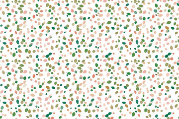 Obraz premium A seamless pattern of tiny green and orange dots scattered on a white background. The minimalist design offers a clean and fresh look for modern projects.