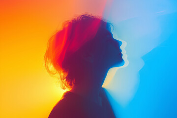 Abstract concept of a human aura glowing with subtle energy patterns in rainbow tones, minimalist aesthetic.