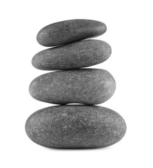 Many stacked spa stones isolated on white