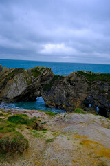 Jurassic coast view in Dorset. Cold winter day. Lulworth Cove cliffs view on a way to Durdle Door. The Jurassic Coast is a World Heritage Site on the English Channel coast. Stair Hole view