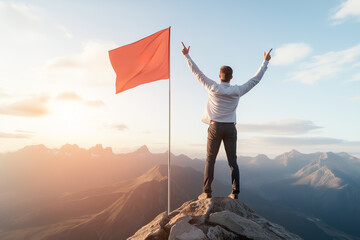 Obraz premium Victorious Man Raising Arms Atop Mountain Peak at Sunset