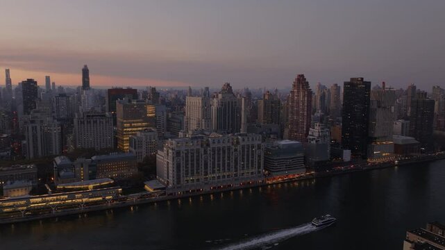 Aerial views showcase New York Presbyterian Hospital or Weill Cornell on East River waterfront, Upper East Side near Midtown Manhattan