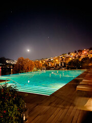 Title:

Summer Poolside View with Bar

Description:

A relaxing summer scene featuring a pool with crystal-clear water, surrounded by comfortable lounge chairs and a stylish bar. The atmosphere is war