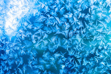 silver abstract Christmas background with frost pattern on glass. Christmas and new year holiday