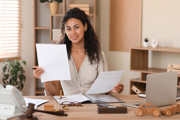 Female African-American lawyer working in office