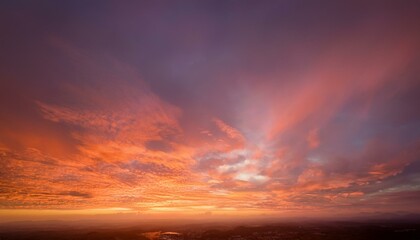 orange and pink historical past autumn or fall heat hues in blurred cloudy sky example dawn or sunset with stormy cloud layout abstract colorful historical past with blur texture