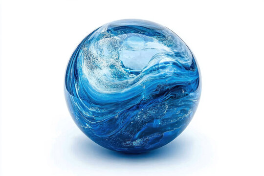 Blue glass ball with swirl pattern resting on sandy beach shining under the sunlight.