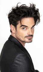 Fototapeta premium Actor poses confidently in stylish attire against a clean white background during a promotional shoot in the studio