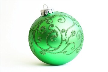 Fototapeta premium A single green Christmas ornament against a clean white background