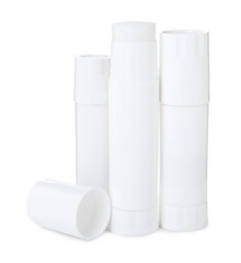 Many different glue sticks isolated on white