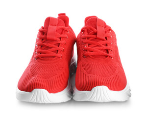Pair of stylish red sneakers isolated on white