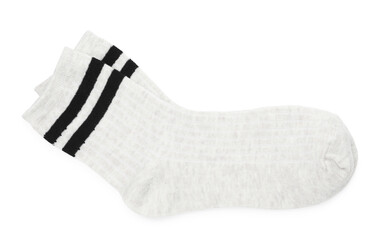 Pair of soft socks isolated on white, top view