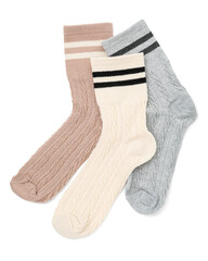 Different soft socks isolated on white, top view