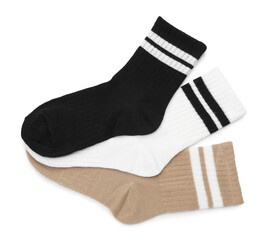 Pairs of soft socks isolated on white, top view