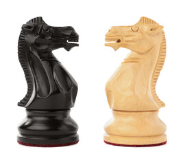 Black and white chess knights isolated on white. Competition concept