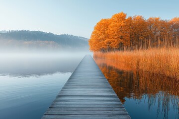 Tranquil autumn walkway lakeside boardwalk landscape photography serene environment wide angle nature's beauty