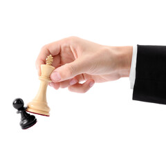 Man with white chess king knocking over black pawn on white background, closeup. Competition concept
