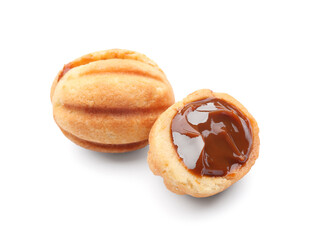 Sweet walnut shaped cookies with boiled condensed milk on white background