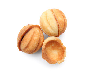 Sweet walnut shaped cookies with boiled condensed milk on white background