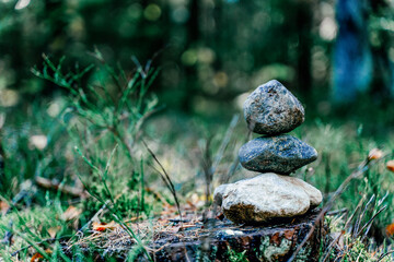 Stacked stones in nature forest. Zen, balance, nature concept