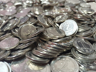 Ukrainian iron money. Money in cash. Ukrainian coins are pouring into pile