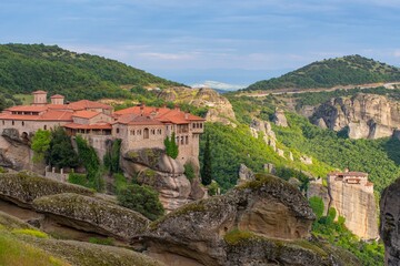 View of Meteora monasteries and the rock formations in the mountains of Greece. Unesco world...