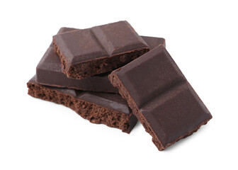 Pieces of delicious dark chocolate isolated on white