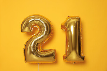 Coming of age party - 21st birthday. Number shaped balloons on orange background