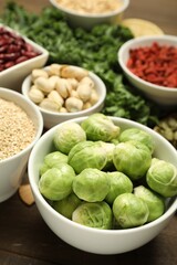 Superfood. Different healthy food products on wooden table, closeup