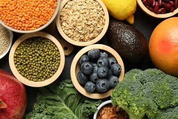 Superfood. Different healthy food products on grey table, flat lay
