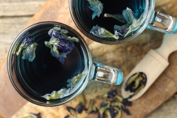 Delicious butterfly pea flower tea on table, flat lay © New Africa