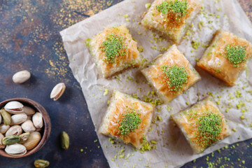 Turkish-style pistachio baklava with a glass of milk.