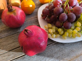 juicy fresh grapes next to fruits