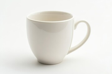 Obraz premium Ceramic coffee mug with a curved handle, isolated on a white background