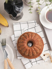 Bundt cake on white tray and white background