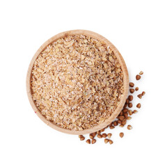 Buckwheat bran in wooden bowl and grains isolated on white, top view