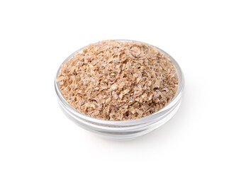 Buckwheat bran in glass bowl isolated on white