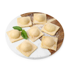 Delicious ravioli with cheese and basil isolated on white