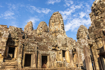 Ancient Bayon temple with carved stone faces, Angkor Thom, Siem Reap, Cambodia