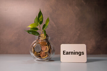 There is notebook with the word Earned Media. It is as an eye-catching image