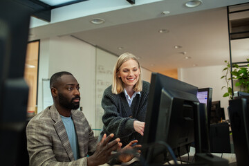Team collaborating and brainstorming in a modern office environment