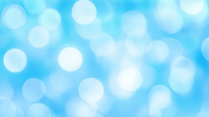 Soft Blue Bokeh Background with Bright Circles and Gentle Light Effects