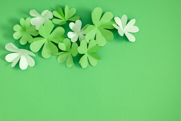 Holiday decoration for St Patrick's Day. Four-leaf clover paper art. Patricks day, clover leaf on...